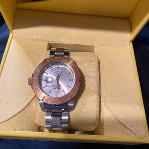 ROSE GOLD AND SILVER INVICTA WOMANS WATCH